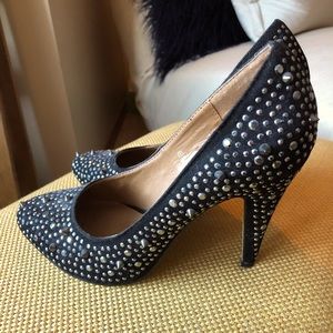 g:21  Black Glitzy heels with stones and studs. Size 7.
